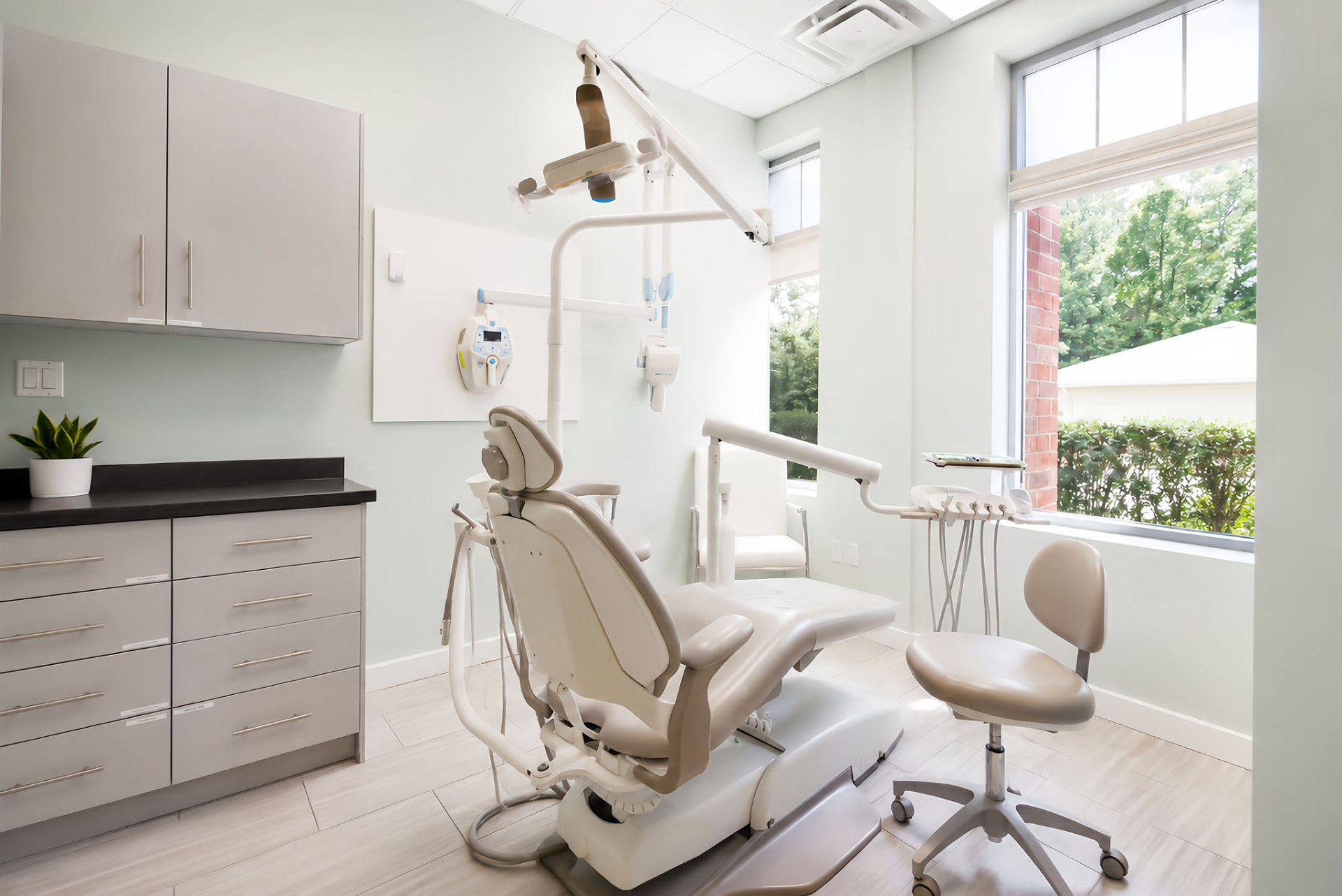 Modern dental treatment room with large window