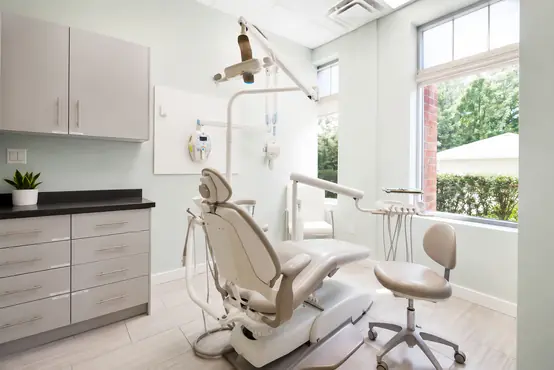 Modern dental treatment room with large window