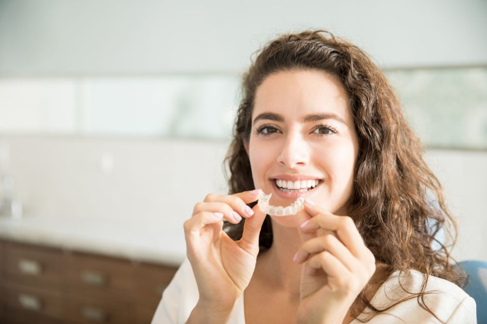 Why Do My Teeth Feel Loose During Invisalign?