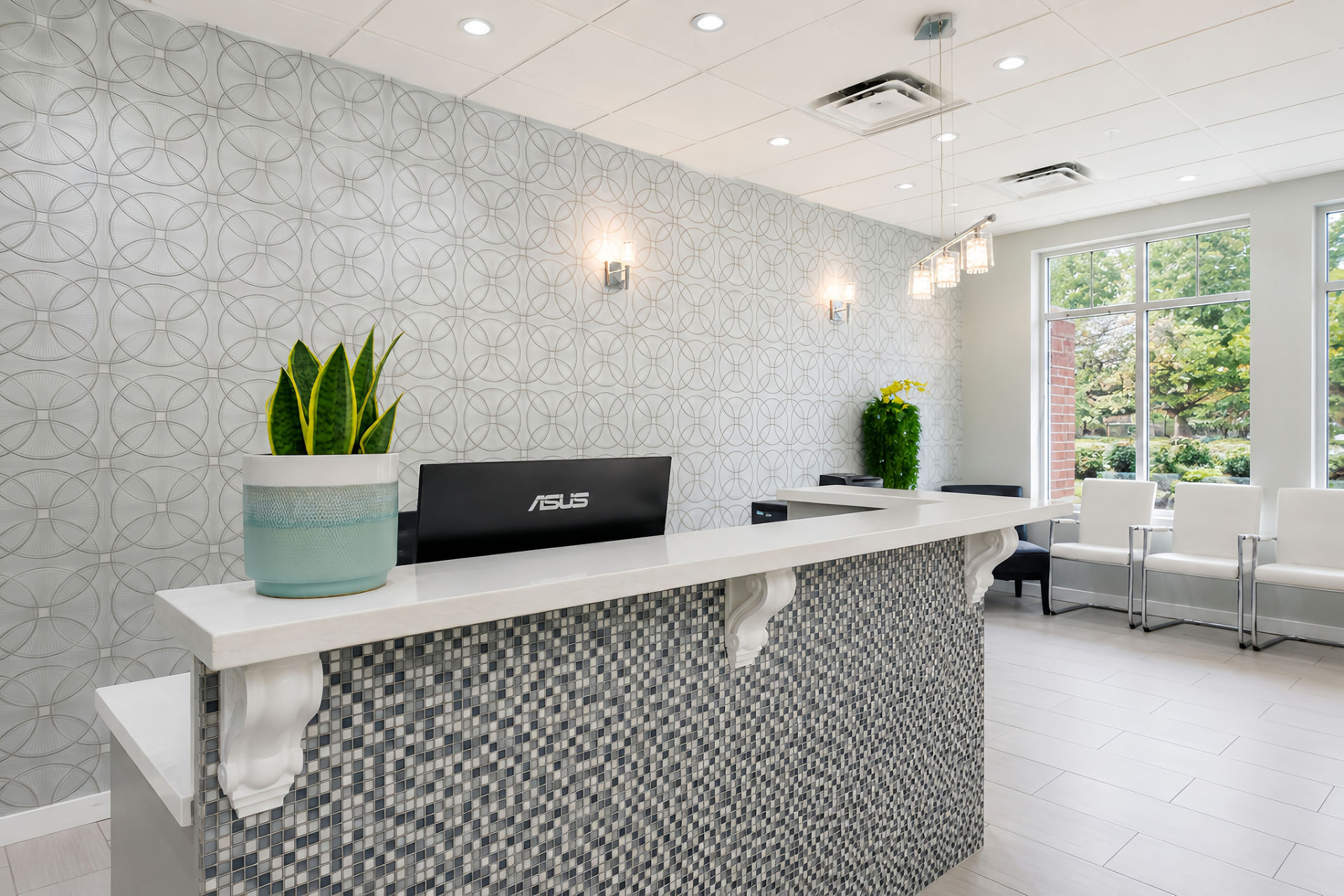 Reception desk with mosaic tile front at Nobleton Dental Smiles